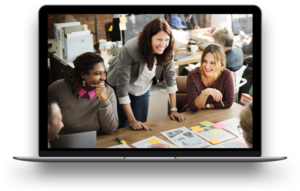 Computer screen showing employees discussing